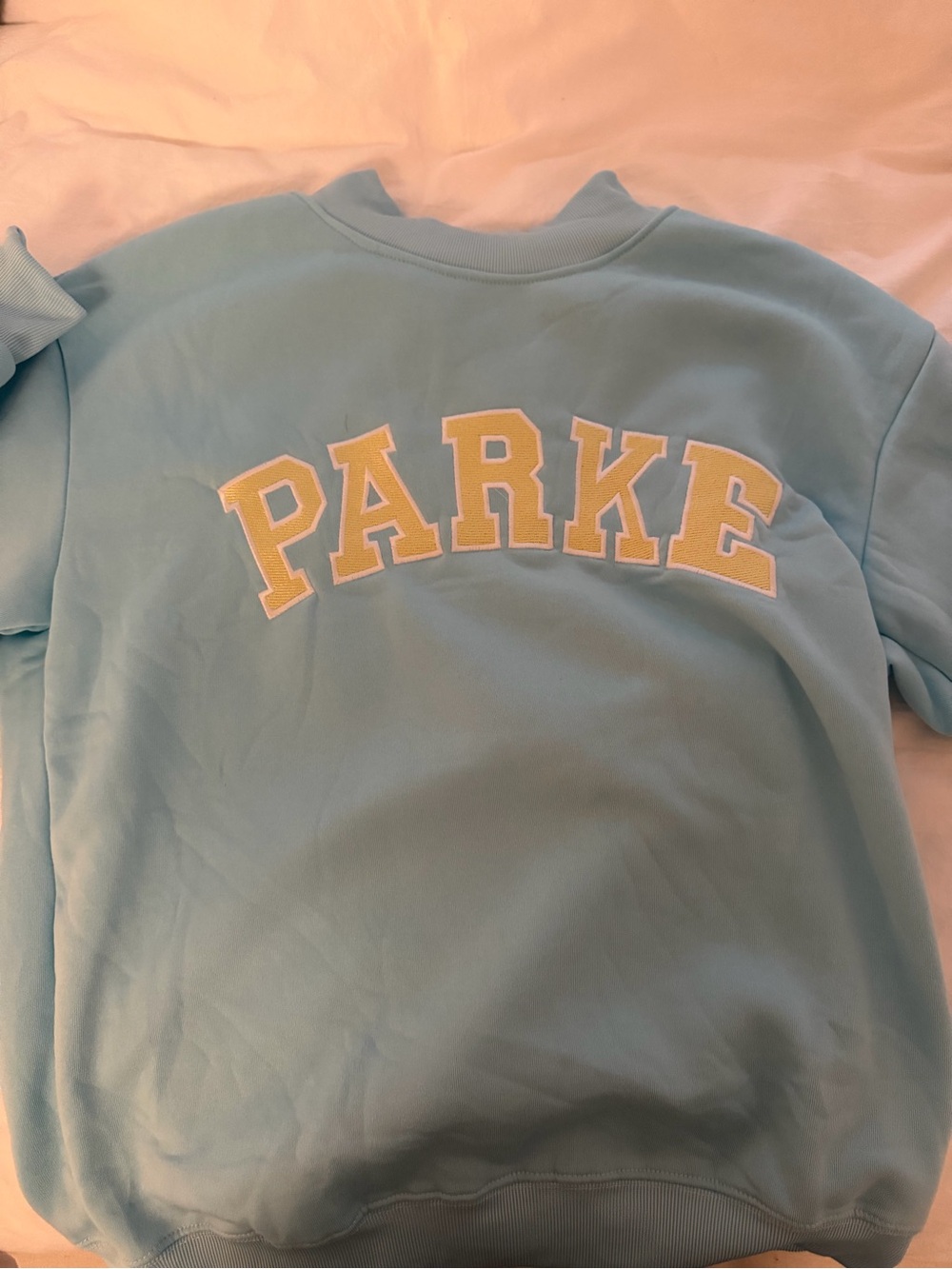 FAKE PARKE Light Blue Sweatshirt with Yellow Appliqué